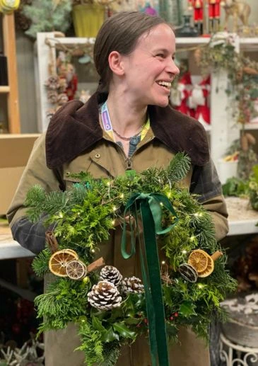 a festive wreath making class for a small group in Liverpool